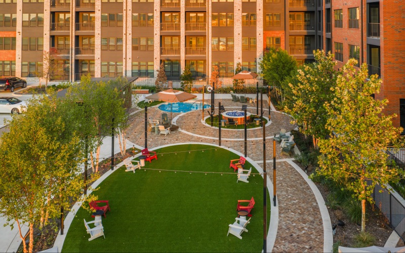 courtyard with chairs and fire pit